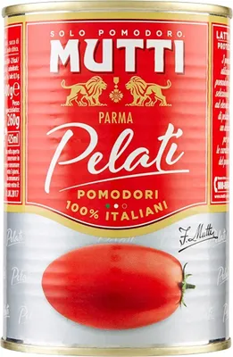 A close-up studio shot of a can of Mutti Pelati tomatoes.