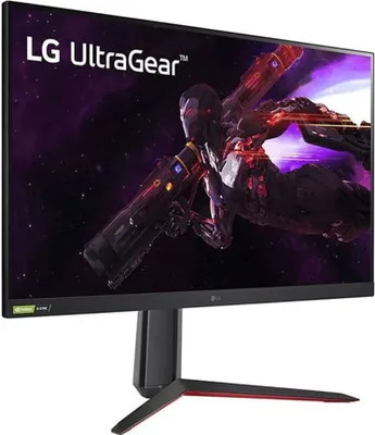 A gaming monitor displaying a futuristic warrior in space.