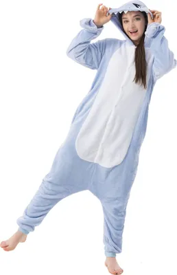 A person wearing a blue shark costume.
