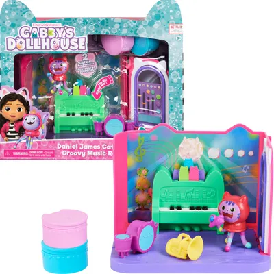 A toy playset featuring characters and accessories from Gabby's Dollhouse, presented in its original packaging and also displayed outside of the packaging.