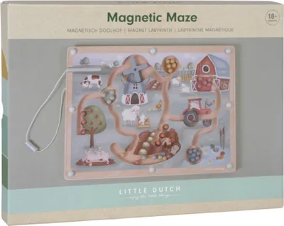The image shows the front of a retail box for a magnetic maze toy with a farm theme.