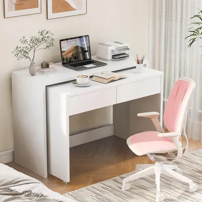 A white desk with a laptop, printer, and a pink office chair in a room.