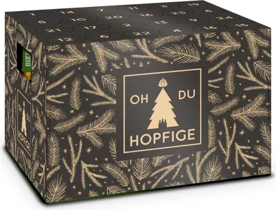 A black advent calendar box with a pine branch pattern and gold lettering. A small green and yellow bottle is visible in a cutout on the side.