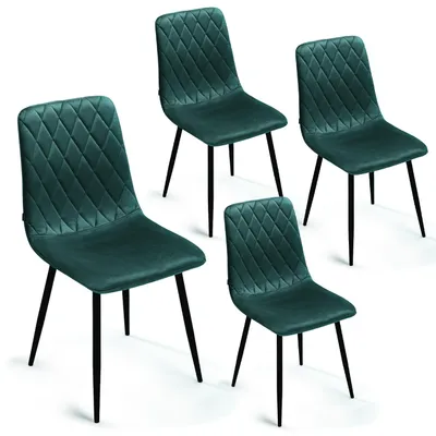 Four green velvet dining chairs with diamond tufting and black metal legs are arranged on a white background.