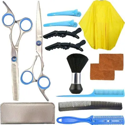 Productafbeelding van Kapserset: haarzaag, kappersjas, complete set