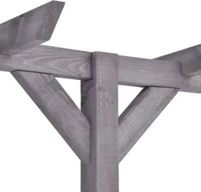 A close-up view of the wooden structure of a pergola.