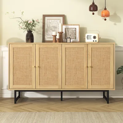 A wooden sideboard with rattan doors is displayed in a room with decorative items on top.