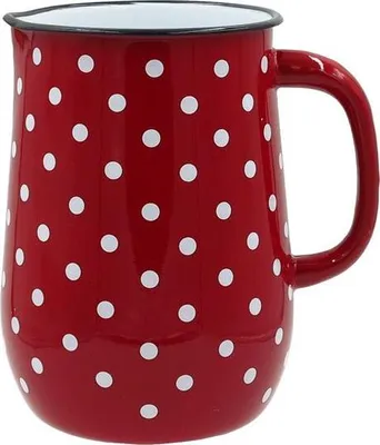 A red polka dot pitcher on a white background.