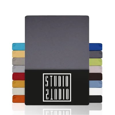 A stack of folded fabric sheets in various colors, with a large gray sheet prominently displayed in the center, and a black band at the bottom with a white logo.