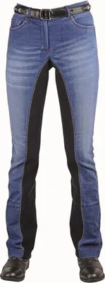 A pair of riding breeches with denim and black panels, worn with black shoes.