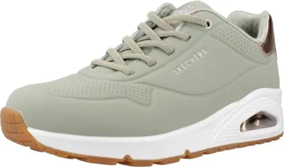 A single green Skechers Uno sneaker is shown from a side angle against a white background.