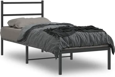 A product shot of a metal bed frame with bedding.
