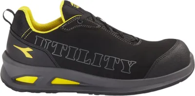 A black and yellow Diadora Utility safety shoe is shown from the side against a white background.