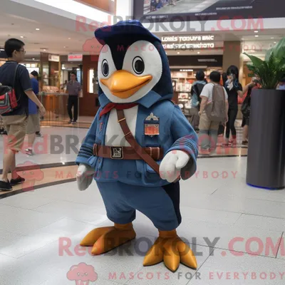 Produktbild von Maskottchen REDBROKOLY eines Marine-Pinguins mit Röhrenjeans und Gürteln