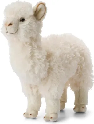 A white plush alpaca toy standing on a white background.