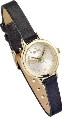 A close-up, angled view of a Harry Potter themed watch with a black leather strap and a gold-colored case.
