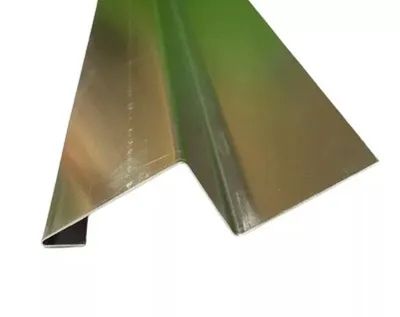 A close-up shot of a metal drip edge profile, commonly used in construction.