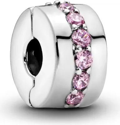 A close-up studio shot of a Pandora charm with pink stones.