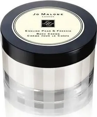 A close-up studio shot of a Jo Malone English Pear & Freesia Body Crème jar against a white background.