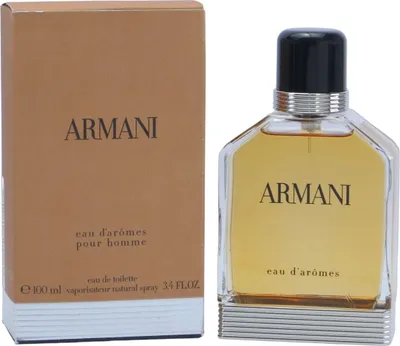 Männlicher Duft Armani Eau d’Arômes in transparentem Flakon mit schwarzem Deckel, präsentiert neben schlichter, brauner Verpackung mit Silberdetails.