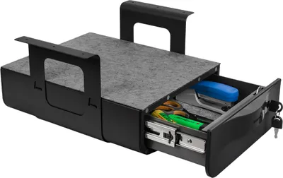 A black under-desk drawer organizer with a gray felt top, containing office supplies like scissors, pens, and a stapler. The drawer is partially open, revealing its contents and metal slides.