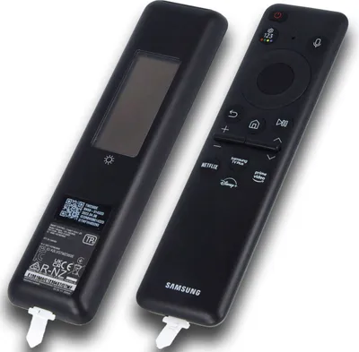 Two black Samsung TV remotes are shown against a white background.