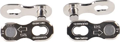 Two silver bicycle chain quick links are shown against a white background.