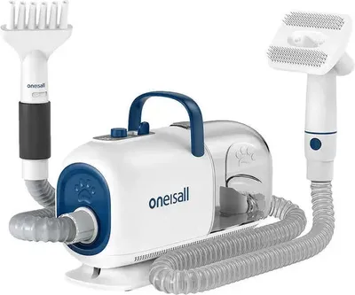 A pet grooming vacuum cleaner with attachments.