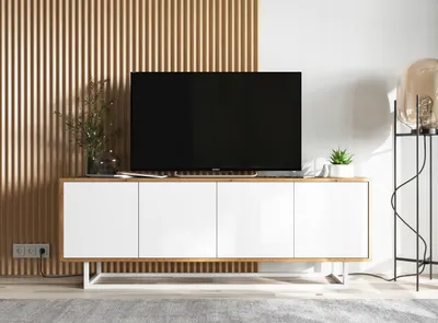 A modern living room with a TV cabinet and television.