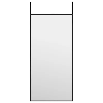 A rectangular mirror with a black frame, suspended by two thin black wires at the top.
