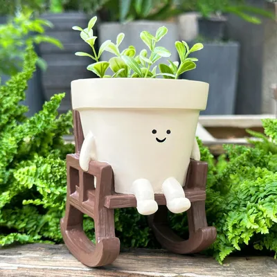 Immagine prodotto di Vaso per piante con decorazione a forma di faccina sorridente, in resina, adatto sia per interni che per esterni, dimensioni 10,5 x 12 x 13,8 cm