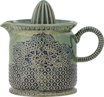 A decorative ceramic citrus juicer.