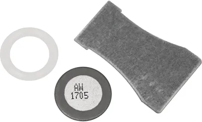 Three small replacement parts for an ultrasonic nebulizer are laid out on a white background.