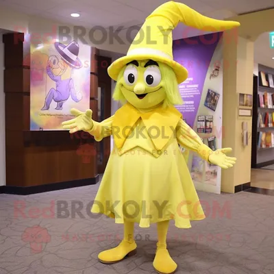 Obrázek produktu pro Postava REDBROKOLY maskota žluté čarodějnice v šatech a kravatách