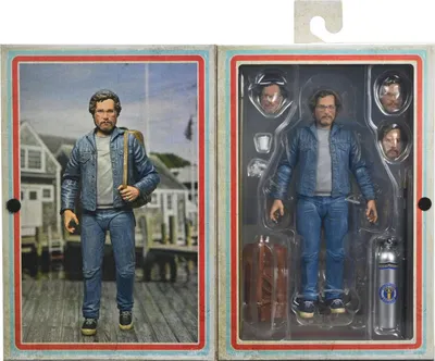 A toy action figure of Matt Hooper from Jaws, displayed in its packaging.