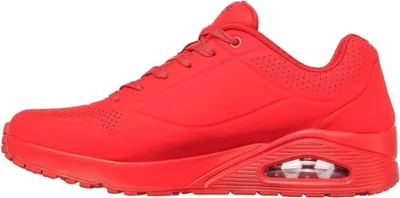 A side view of a red Skechers Uno-Stand on Air sneaker against a white background.