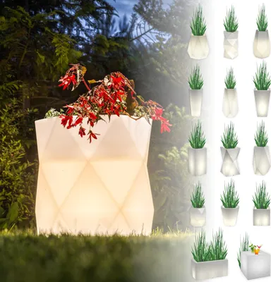 A large, illuminated planter with red flowers sits on grass in a garden at dusk, with smaller illuminated planters and plants arranged in a collage on the right side of the image.