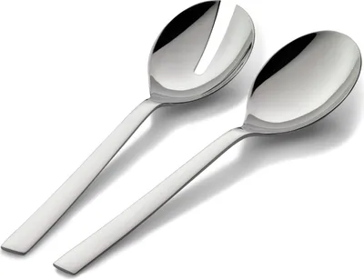 A pair of stainless steel salad servers on a white background.