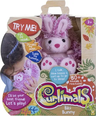 A child is interacting with a plush toy bunny in its packaging.