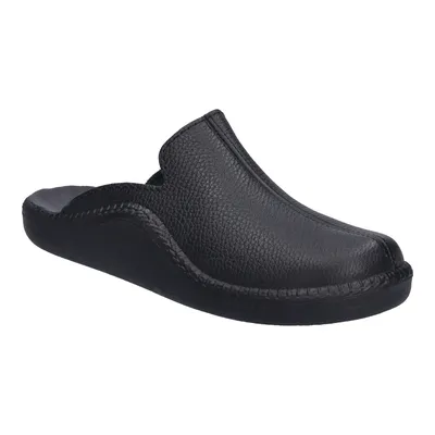 A black leather mule slipper is shown against a white background.