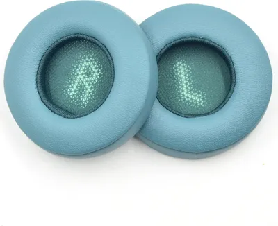 Two blue ear pads for headphones are shown on a white background.