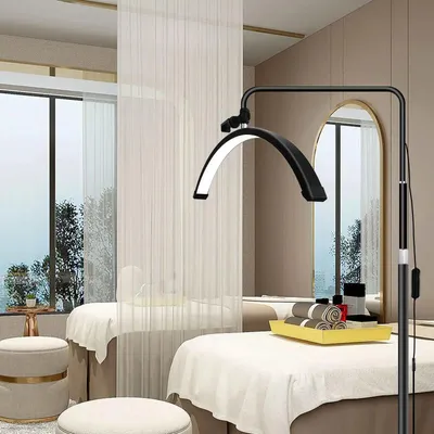 Zdjęcie produktu dla Lampa kosmetyczna stojąca - lampa LED w kształcie półksiężyca - 61 cm - 3 barwy światła - obrotowa głowica o 360° - uchwyt na telefon - kolor czarny