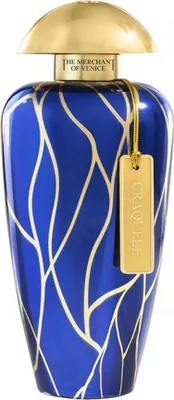 A perfume bottle with a blue and gold design.