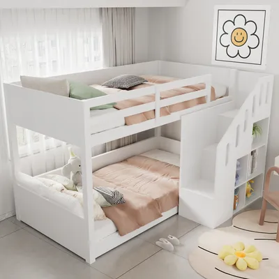 A white bunk bed with stairs and storage shelves in a bedroom.