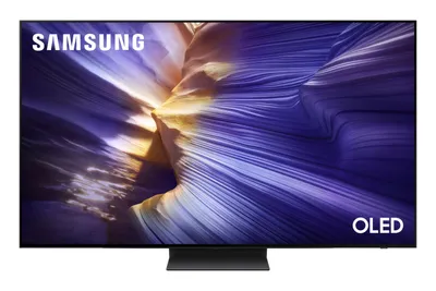 A Samsung OLED television on a stand, displaying a colorful abstract image.