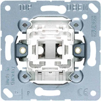 The back of a light switch mechanism with mounting bracket.