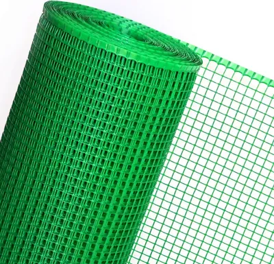 A roll of green plastic mesh fencing.