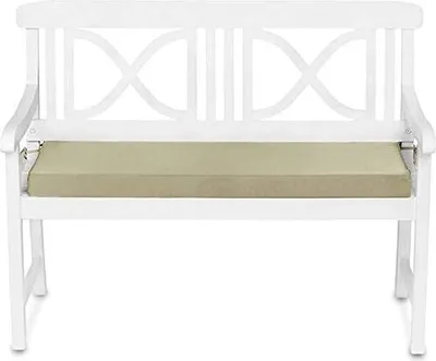 A white garden bench with a sand-colored cushion.
