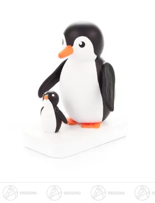 Imagen del producto de Miniatura de pingüino madre con cría. Dimensiones: 3,5 cm x 4,5 cm x 2 cm. Producto nuevo