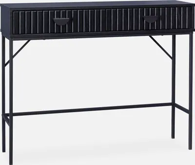 A black console table with two drawers and a ribbed wood-look front is shown against a white background.